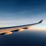 timelapse photo of white plane wing qgz8fu imla